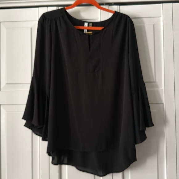 Tops - Women’s black blouse size large.